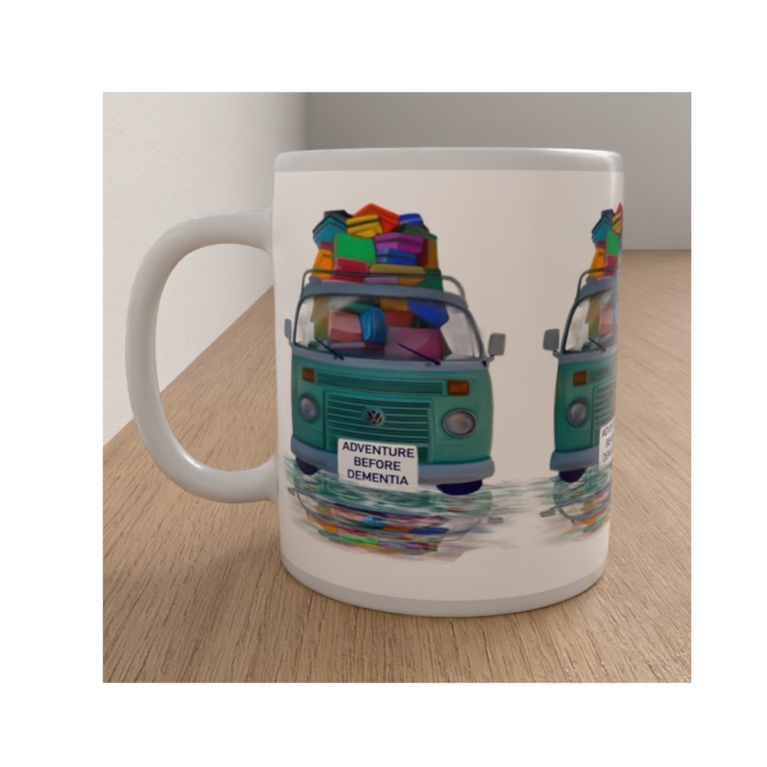 Side view of the Adventure Before Dementia mug featuring two turquoise campervans with colourful luggage against a white background.