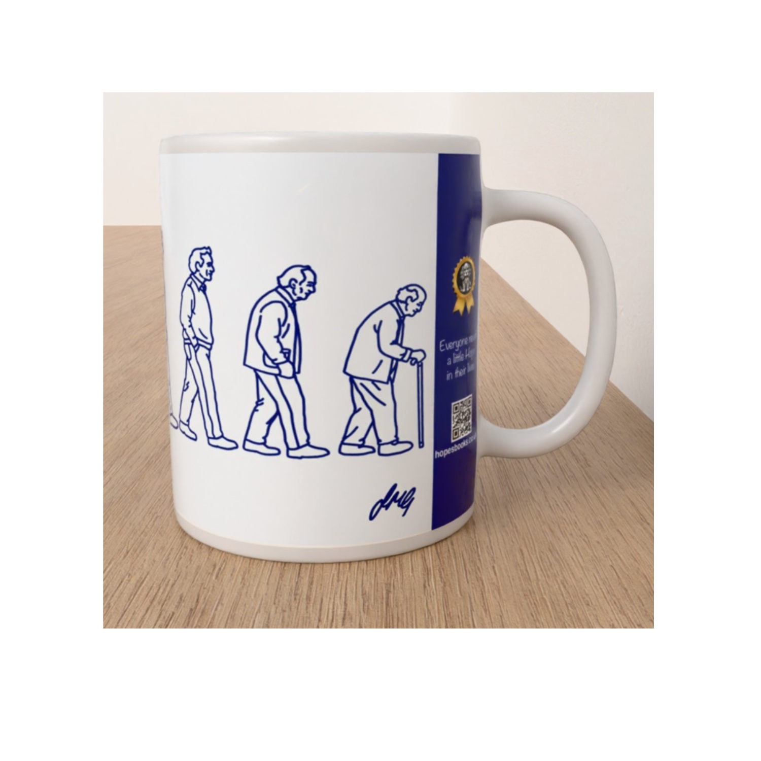 Side view of the Manhood mug featuring blue line drawings of a man ageing into old age, including an elderly man walking with a stick.