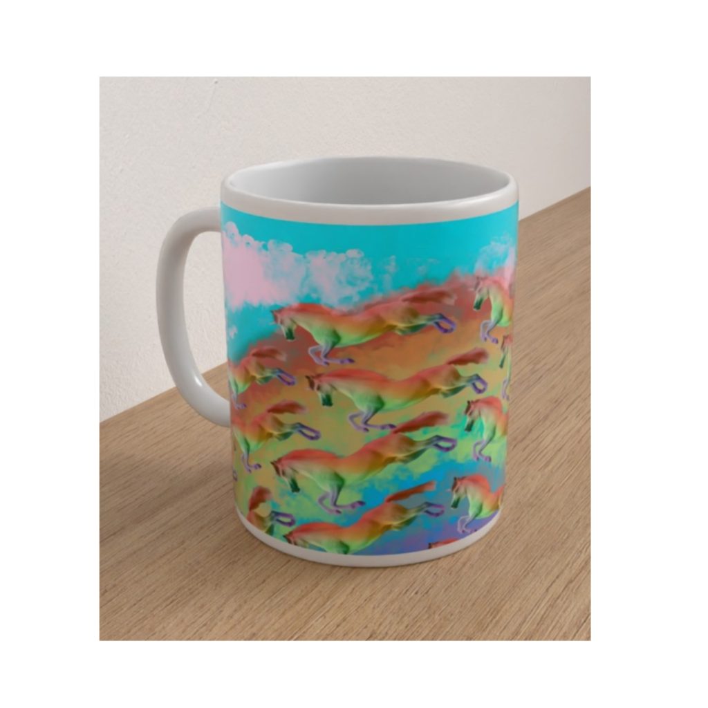 Angled white ceramic mug featuring colourful galloping horses against a vibrant turquoise and pink sky.